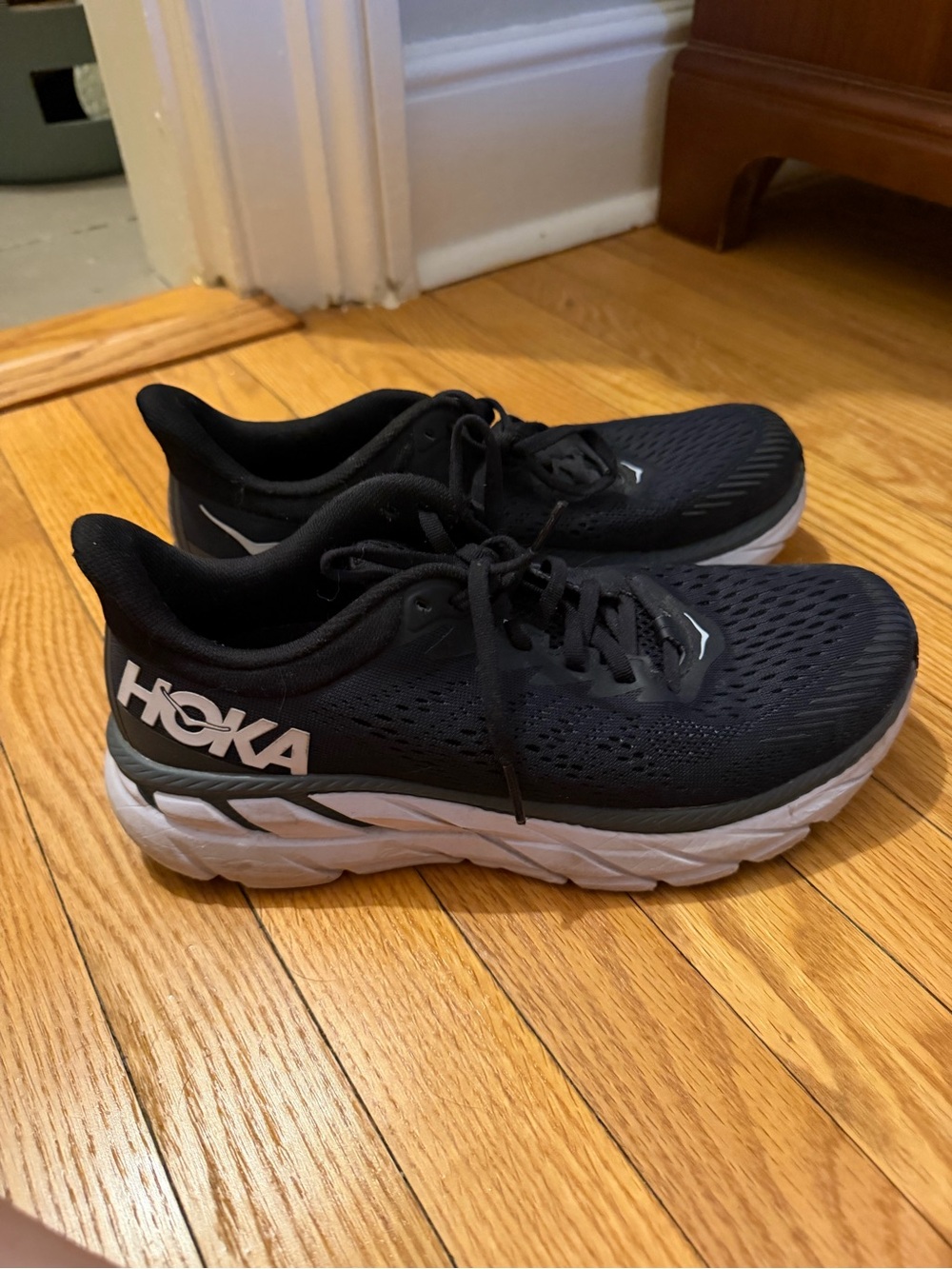 Hoka Black and White Cushioning Running Sneakers